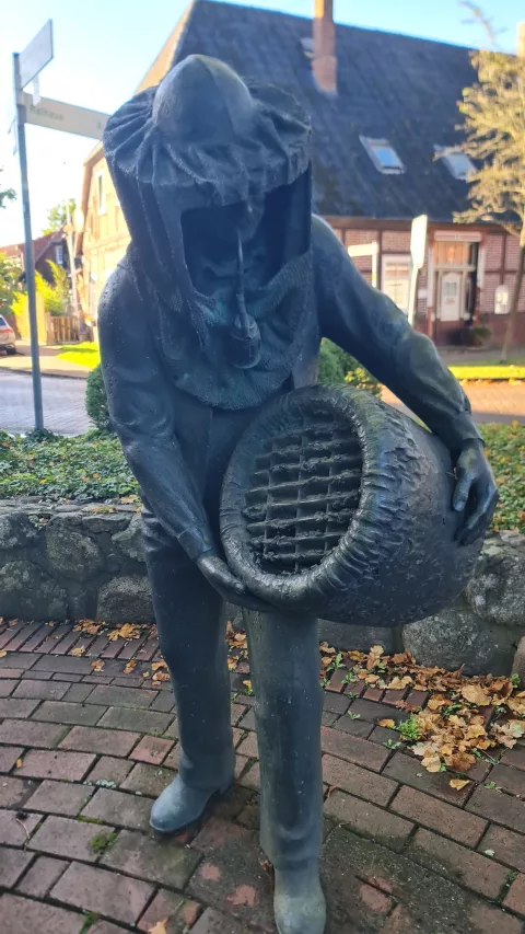 A statue of a beekeeper, it reminded me of my father